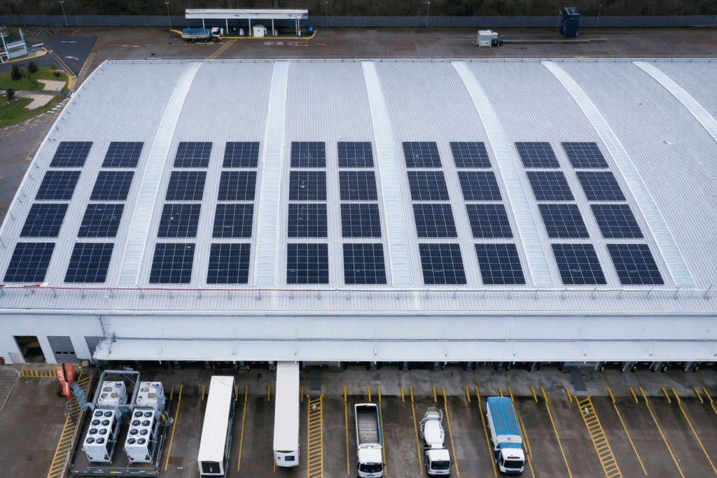 UK REIT Solar & Battery Storage Project Solar panels on UK warehouse rooftop